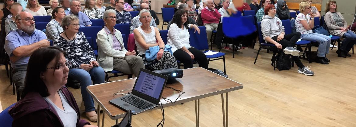 audience at a Saturday Forum