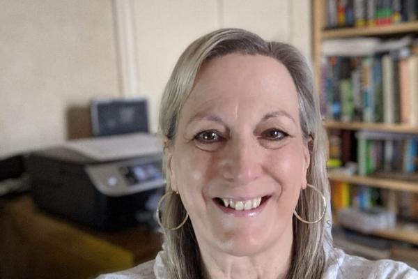 Louise McGlen hosting a virtual meeting